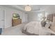 Beautiful bedroom featuring a modern dresser, neutral tones, and great natural light at 3700 Horton Hill Dr, New Hill, NC 27562