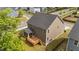 Exterior shot featuring a rear view of the home with a spacious deck and screened porch at 3700 Horton Hill Dr, New Hill, NC 27562