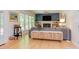 Bright living room with fireplace, built in shelving, large windows and view into backyard at 401 Robert Hunt Dr, Carrboro, NC 27510