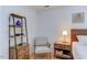 Inviting bedroom space featuring hardwood floors, side table, and ample shelving at 401 Robert Hunt Dr, Carrboro, NC 27510