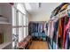 Large walk-in closet with custom shelving, shoe racks, and organized storage solutions at 401 Robert Hunt Dr, Carrboro, NC 27510