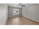 Bedroom featuring wood floors and a window for natural light at 412 W Stalllings St, Clayton, NC 27520