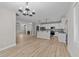 Open floor plan featuring modern kitchen, and living room with fireplace at 412 W Stalllings St, Clayton, NC 27520
