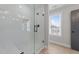 Shower featuring frameless glass and modern tile at 412 W Stalllings St, Clayton, NC 27520