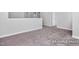 Loft featuring neutral carpet and base molding at 416 Longleaf Glen Ln, Zebulon, NC 27597