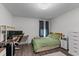 Bedroom with desk, neutral walls, and wood flooring at 513 Heswall Ct, Rolesville, NC 27571