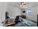 Comfortable bedroom with ceiling fan, neutral walls, and a bright window at 513 Heswall Ct, Rolesville, NC 27571