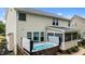Backyard with hot tub, patio, and well maintained landscaping at 513 Heswall Ct, Rolesville, NC 27571