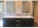 Bathroom vanity features double sinks, granite countertop, and modern fixtures at 550 Saplin Branch Rd, Timberlake, NC 27583