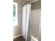 Bathroom shower with white subway tile, gray grout, and chrome fixtures at 550 Saplin Branch Rd, Timberlake, NC 27583
