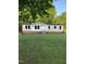 Charming single-story home with a well-manicured lawn and lovely landscaping at 550 Saplin Branch Rd, Timberlake, NC 27583