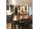 Spacious kitchen featuring a large island, stainless steel appliances, and an adjacent dining area at 550 Saplin Branch Rd, Timberlake, NC 27583