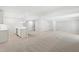 Basement featuring a stylish bar area with countertop seating and modern pendant lighting at 569 Freedom Trail Dr, Willow Springs, NC 27592