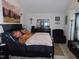 Comfortable bedroom with a cozy bed, stylish furniture, and a tranquil decorative setting at 633 Longstanton Ave, Zebulon, NC 27597