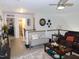 Inviting living room space with a large sectional and upstairs view at 633 Longstanton Ave, Zebulon, NC 27597