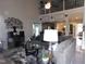 Cozy living room featuring vaulted ceilings and open floor plan to the kitchen at 633 Longstanton Ave, Zebulon, NC 27597