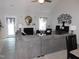 Comfortable living room featuring vaulted ceilings, fireplace and an open layout at 633 Longstanton Ave, Zebulon, NC 27597