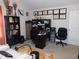 Spacious office area with built-in shelving, multiple desks, and ample seating at 633 Longstanton Ave, Zebulon, NC 27597