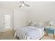 Bright bedroom with soft carpet, a queen sized bed, and natural light from a window at 704 Valleywater St, Fuquay Varina, NC 27526