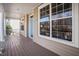 Charming front porch with wood floors and a light blue front door at 704 Valleywater St, Fuquay Varina, NC 27526