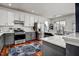 Modern kitchen featuring stainless steel appliances, granite countertops, and ample cabinet space at 704 Valleywater St, Fuquay Varina, NC 27526
