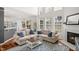 Open-concept living area with plenty of natural light and seamless transition to the dining space at 704 Valleywater St, Fuquay Varina, NC 27526