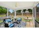 Cozy screened porch provides an outdoor space for entertaining and relaxing at 704 Valleywater St, Fuquay Varina, NC 27526