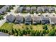 Aerial view of the property showcasing the backyard, patio, and lush landscaping at 79 Tarwick Ave, Chapel Hill, NC 27516