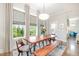 Bright dining area features a wooden table, bench seating, and lots of natural light at 79 Tarwick Ave, Chapel Hill, NC 27516