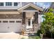 Covered front porch showing stone pillars and a pergola, with a glimpse of the front door at 79 Tarwick Ave, Chapel Hill, NC 27516