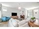 Spacious living room with hardwood floors, stylish furnishings, and plenty of natural light at 79 Tarwick Ave, Chapel Hill, NC 27516