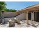Charming outdoor patio with a wooden pergola, comfortable seating, and modern design at 810 Maple Berry Ln # 104, Raleigh, NC 27607