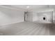 Large bedroom showcases plush carpeting, tray ceiling, and access to the en-suite bathroom at 95 Black Walnut Dr # 191, Garner, NC 27529