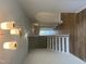Hallway and stairway with wood flooring and white trim, leading to an upper level at 95 Black Walnut Dr # 191, Garner, NC 27529