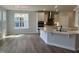 Bright kitchen with an island, stainless appliances, and sleek countertops at 95 Black Walnut Dr # 191, Garner, NC 27529