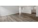 Open-concept living room featuring modern floors and neutral paint at 95 Black Walnut Dr # 191, Garner, NC 27529
