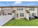 This home boasts a fenced backyard with a grassy area and a patio, perfect for relaxing outdoors at 9805 Precious Stone Dr, Wake Forest, NC 27587