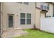 Fenced backyard featuring a patio and grassy area, providing a private outdoor space at 9805 Precious Stone Dr, Wake Forest, NC 27587