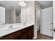 Bathroom features a double sink vanity, large mirror and tiled floors, plus a shower-tub combination at 9805 Precious Stone Dr, Wake Forest, NC 27587