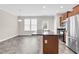 Kitchen area with a center island and stainless steel appliances at 9805 Precious Stone Dr, Wake Forest, NC 27587