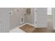 This laundry room has tile floors and washer/dryer hookups with a nearby door at 9805 Precious Stone Dr, Wake Forest, NC 27587