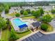 The neighborhood has a community pool with lounge chairs and a covered seating area at 9805 Precious Stone Dr, Wake Forest, NC 27587