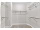 Spacious walk-in closet with built-in shelving for maximum storage and organization at 1001 Tender Dr, Apex, NC 27502