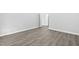 Spacious bedroom with neutral walls, showing ample room for furniture and personalization to make it your own space at 1009 Middleground Cir, Durham, NC 27713