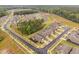Aerial view of a Primary-planned community surrounded by lush greenery at 1009 Middleground Cir, Durham, NC 27713