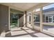 Screened porch with view of backyard at 1009 Middleground Cir, Durham, NC 27713