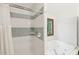 Bathroom with shower and soaking tub near a window overlooking the yard at 106 Shady Point Ct, Durham, NC 27713
