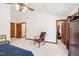 Bedroom features a ceiling fan, and large windows for natural light at 106 Shady Point Ct, Durham, NC 27713