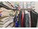 Organized closet featuring shelves, hanging rods, and ample storage for clothing and accessories at 106 Shady Point Ct, Durham, NC 27713