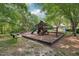 Large playground area in a fenced yard; perfect for  at 106 Shady Point Ct, Durham, NC 27713